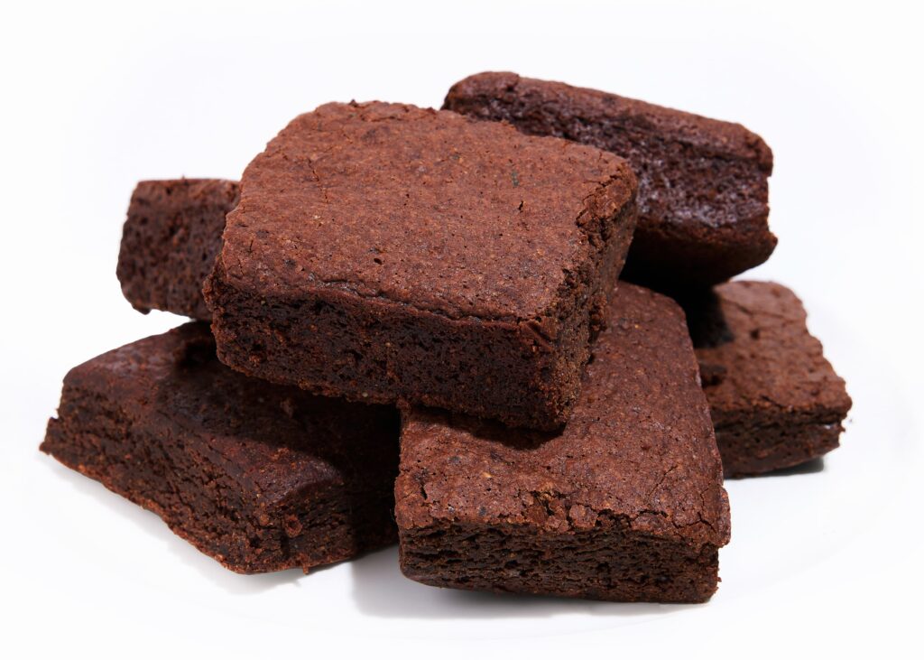 Dark, rich brownies made with black beans and cacao, topped with a slight dusting of salt.