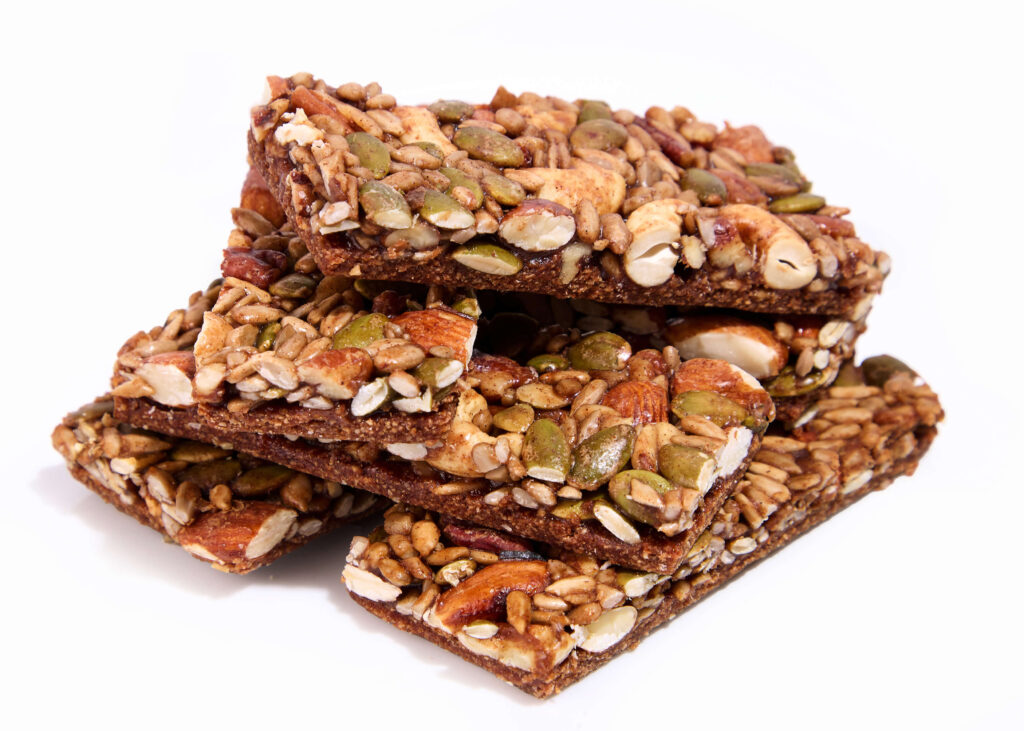 A crunchy granola-style bar packed with nuts, and seeds.