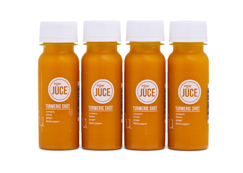 A four-pack of golden wellness shots infused with turmeric, ginger, and lemon.